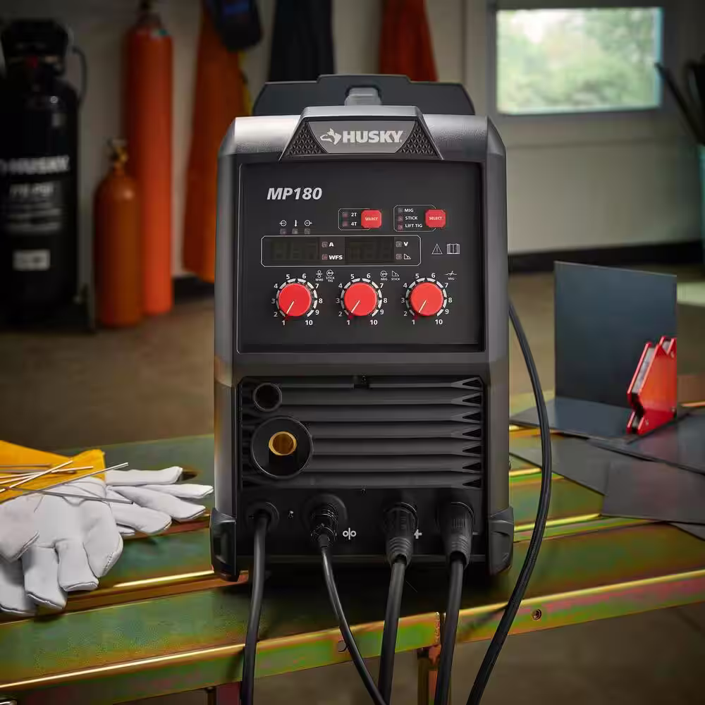 Husky Single Phase 180 Amp 240-Volt/120-Volt AC Wire Feed 180 MIG Wire Feed Welder with Foot Pedal and Dual Voltage Technology