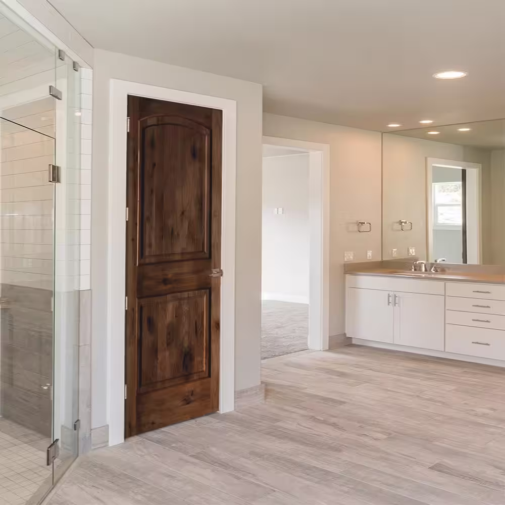 Krosswood Doors Rustic Knotty Alder 2-Panel Top Rail Arch Solid Wood Core Single Prehung Interior Door