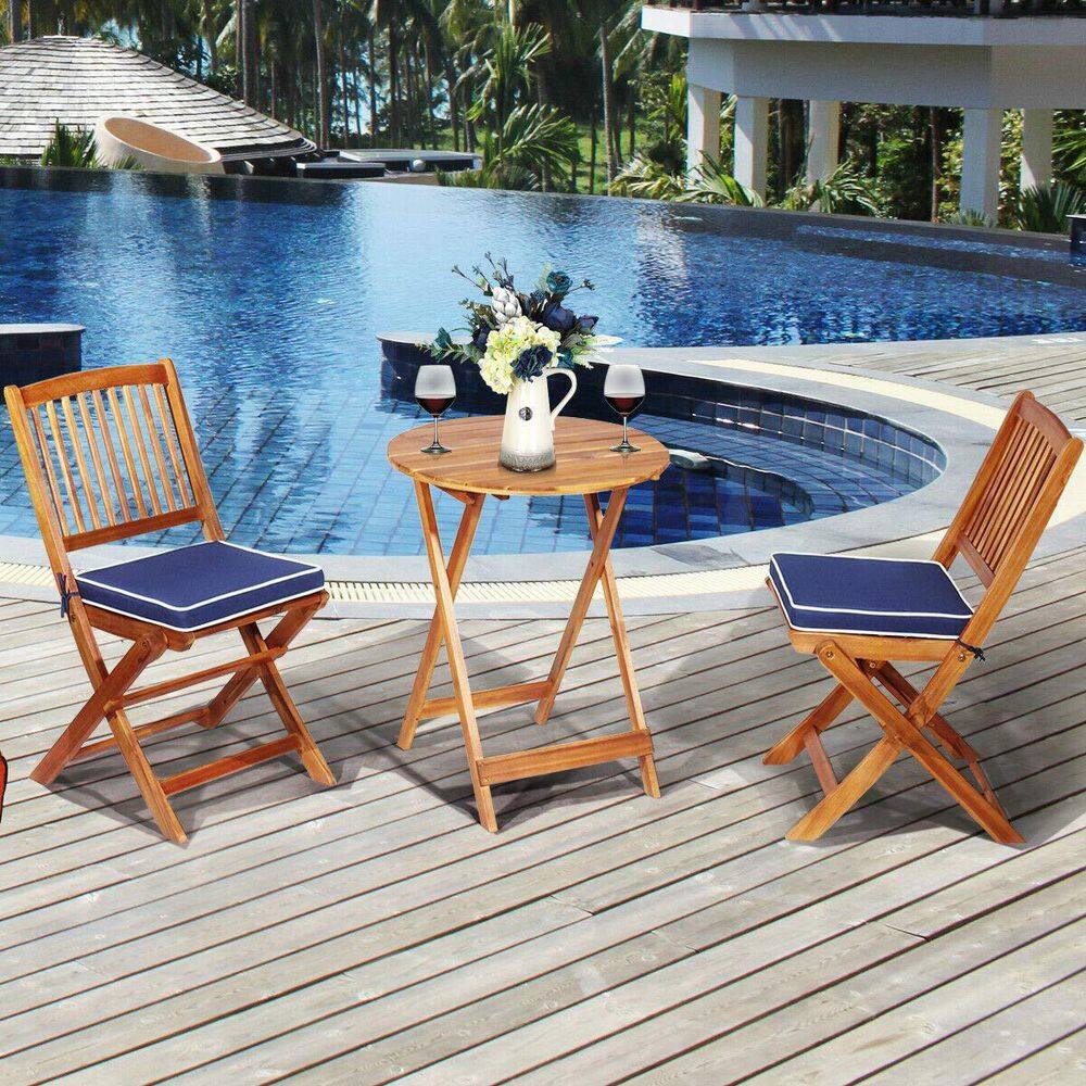 Alpulon Brown 3-Piece Folding Wooden Outdoor Bistro Set with Navy Cushions