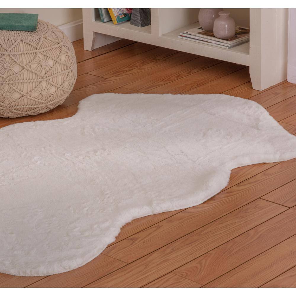 Home Decorators Collection Piper Snow 3 ft. x 5 ft. Sheepskin Solid Polyester Area Rug