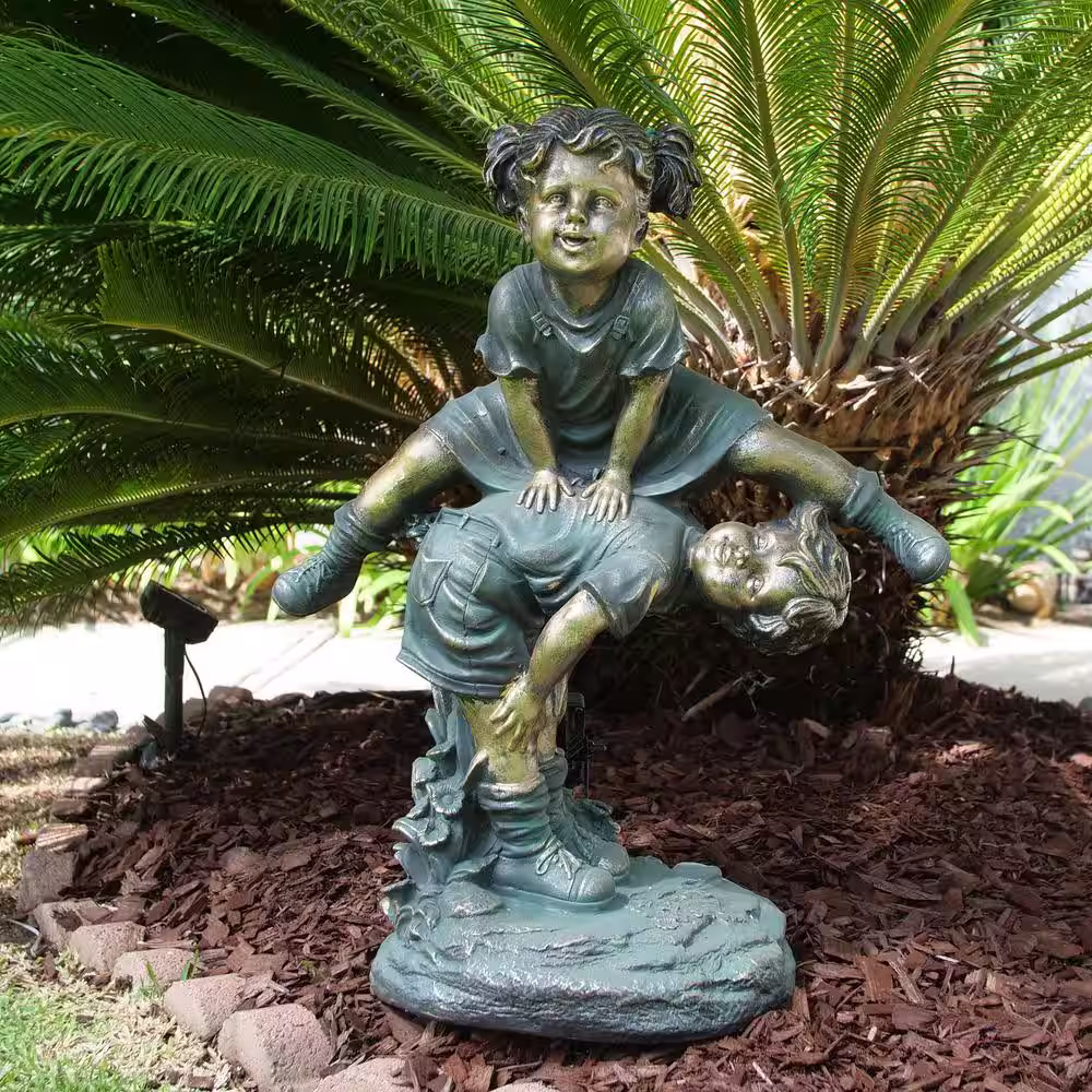 Alpine Corporation 26 in. Tall Indoor/Outdoor Girl Jumping Over Boy Statue Yard Art Decoration