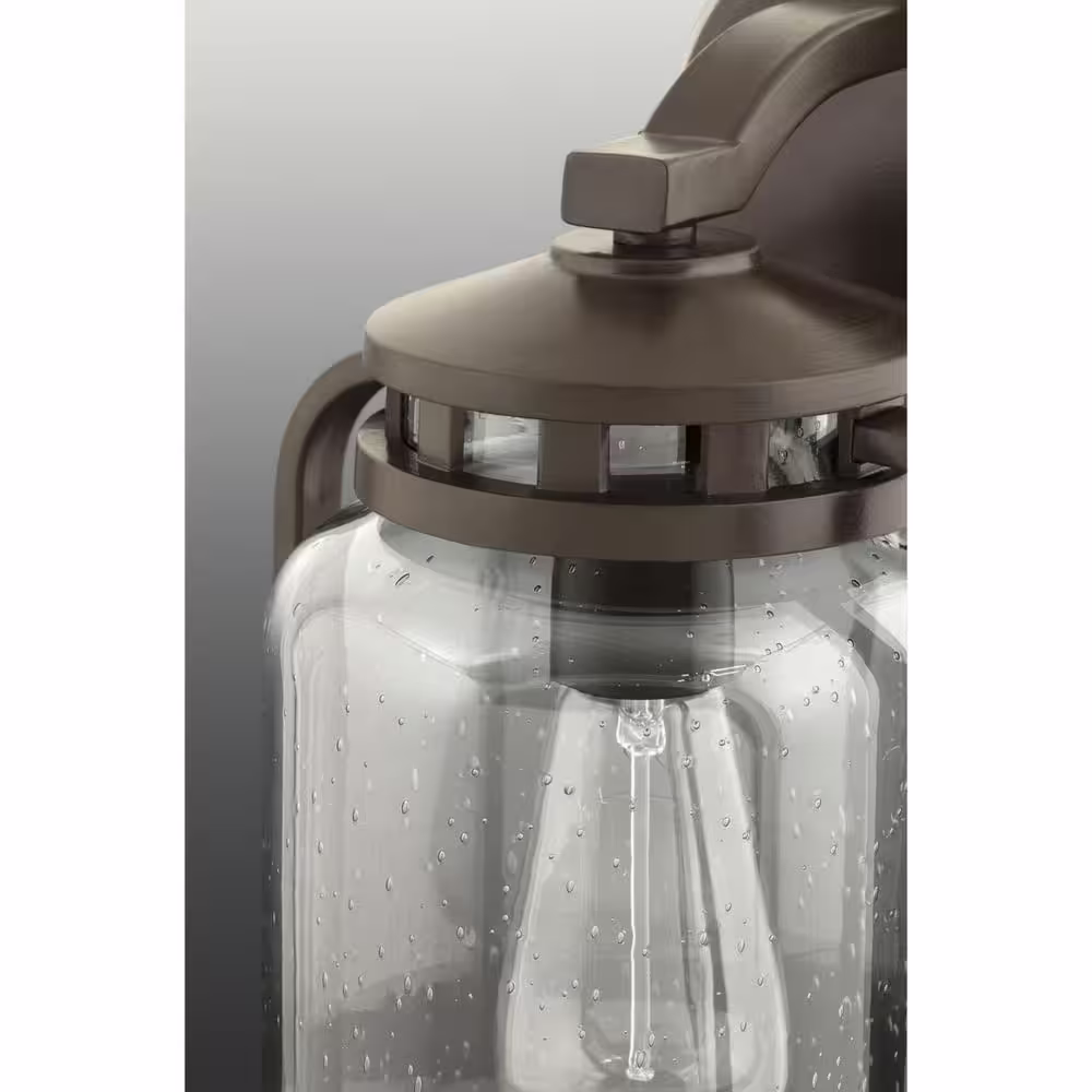 Progress Lighting Botta Collection 1-Light Antique Bronze Clear Seeded Glass Farmhouse Outdoor Small Wall Lantern Light