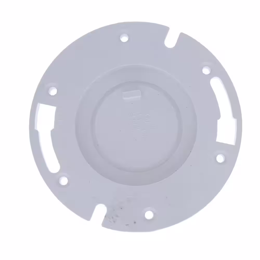 JONES STEPHENS 7 in. O.D. PVC Water Closet (Toilet) Flange With Knockout, Fits Over 3 in. Schedule 30 Pipe