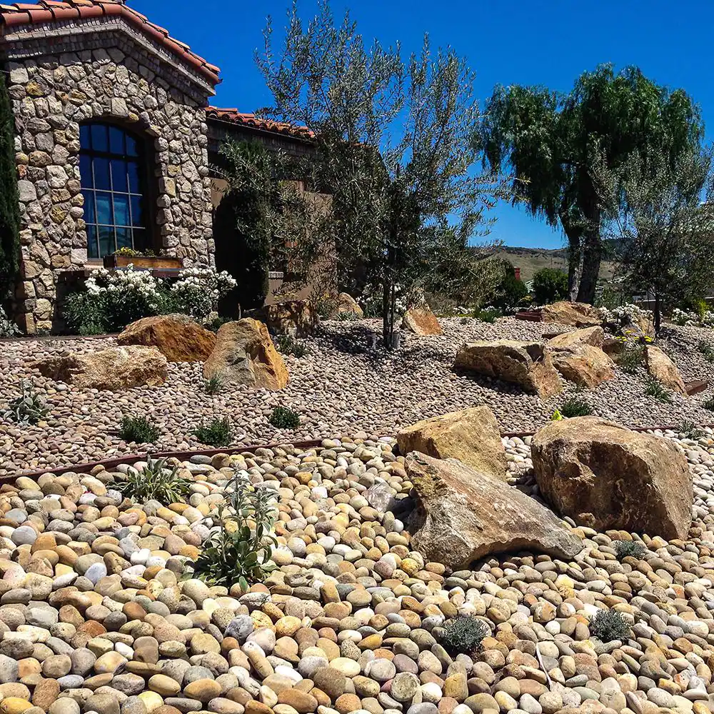 Southwest Boulder & Stone 0.50 cu. ft. 3 in. to 5 in. Buff Mexican Beach Pebble Smooth Round Rock for Gardens, Landscapes and Ponds
