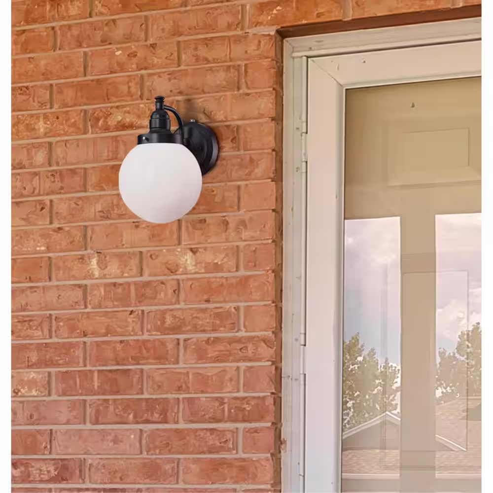 Westinghouse Eddystone 1-Light Matte Black Outdoor Wall Mount Sconce with White Opal Glass, Dusk to Dawn Sensor