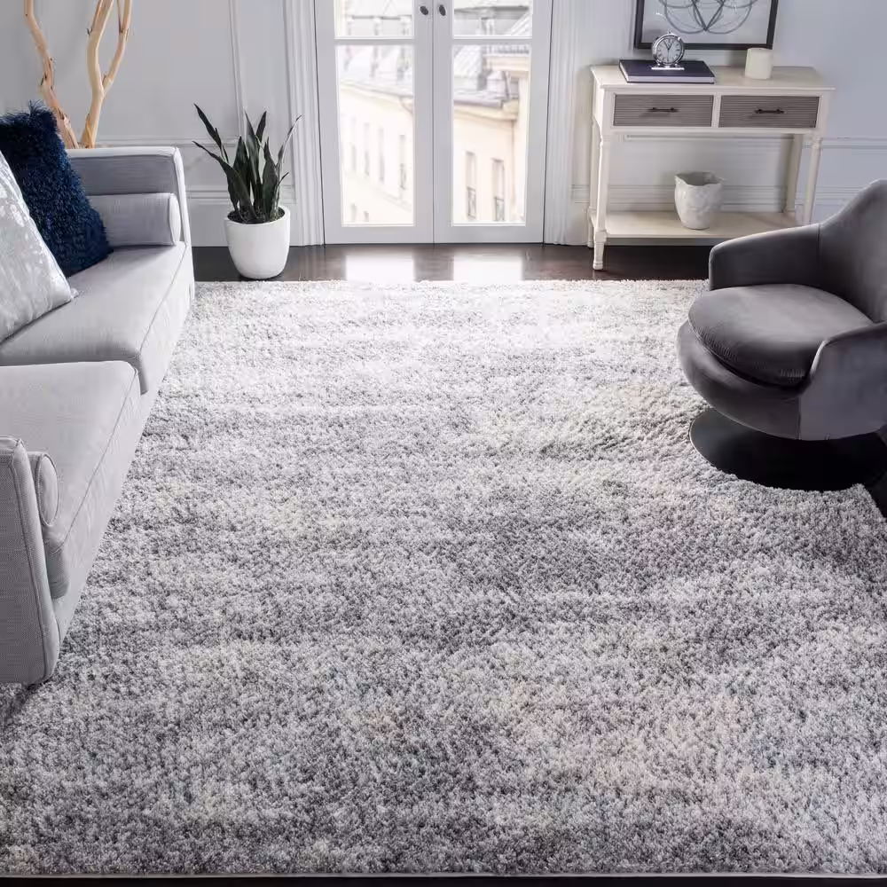 SAFAVIEH Berber Shag Gray/Cream 10 ft. x 14 ft. Distressed Solid Color Area Rug