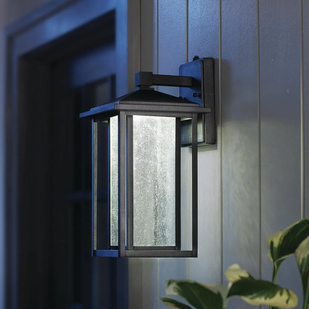 Home Decorators Collection Mauvo Canyon Black Dusk to Dawn LED Outdoor Wall Light Fixture with Seeded Glass