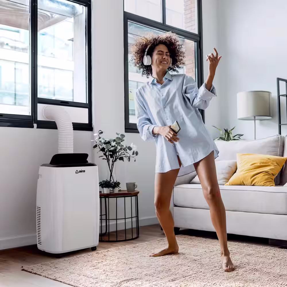 AIRO COMFORT 10,000 BTU 115-Volt Portable Air Conditioner Cools 450 sq. ft. with Dehumidifier Function and LCD Remote White