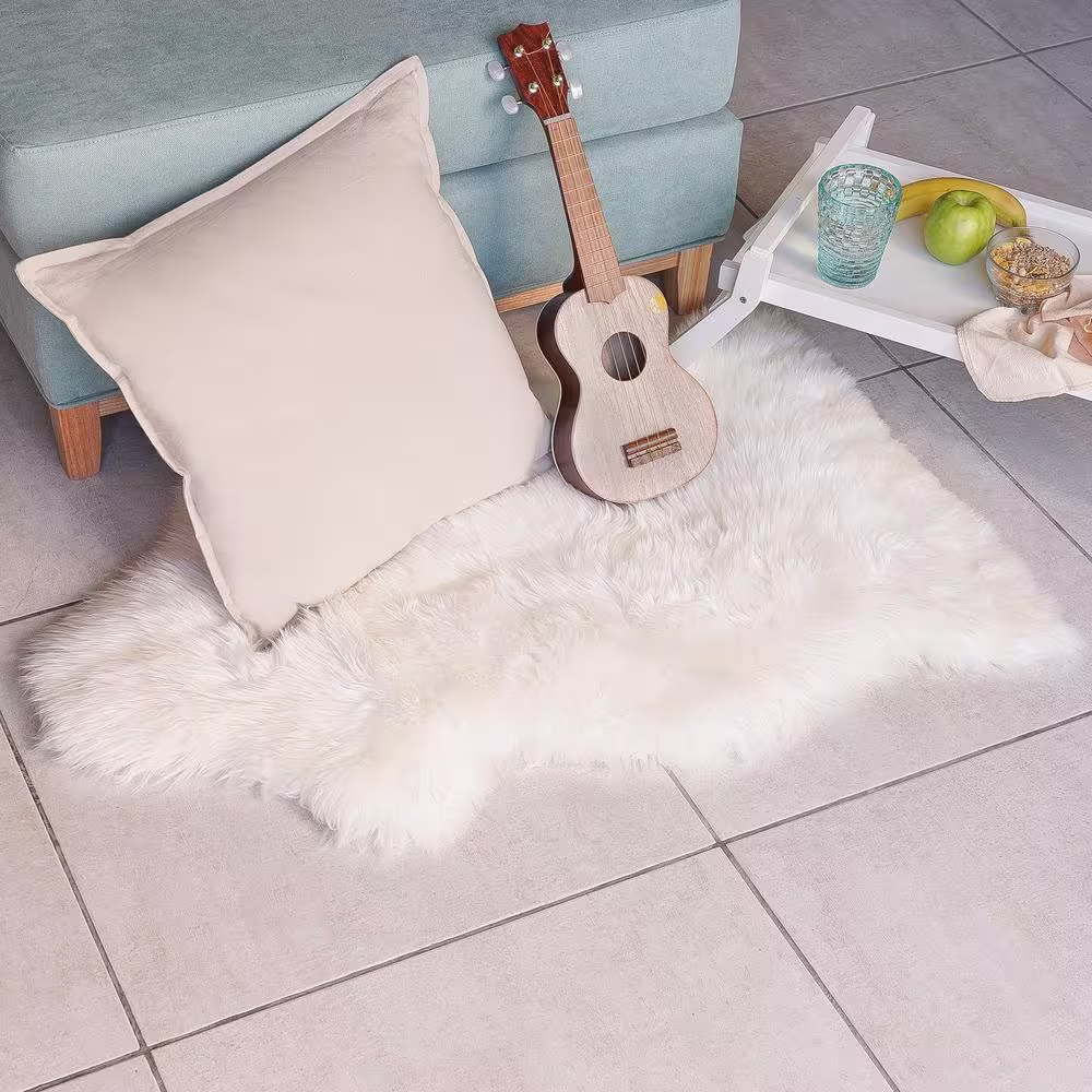Home Decorators Collection Unshorn Sheepskin White 2 ft. x 3 ft. Animal Shape Area Rug