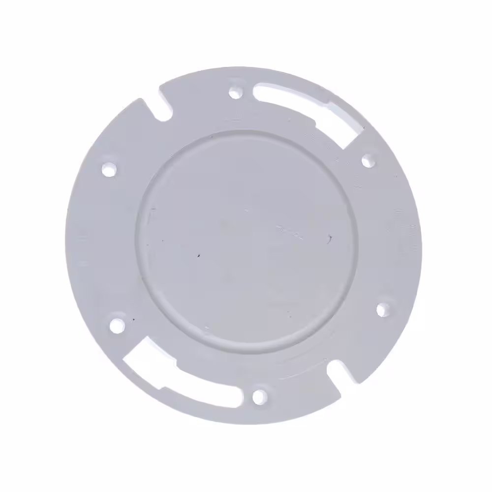 JONES STEPHENS 7 in. O.D. Plumbfit PVC Water Closet (Toilet) Flange With Knockout, Fits Over 4 in. Schedule 40 DWV Pipe