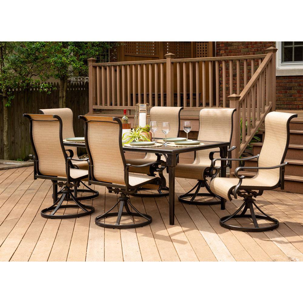 Hanover Brigantine 7-Piece Aluminum Outdoor Dining Set with a 40 in. x 70 in. Glass-Top Table and 6-Sling Swivel Rockers