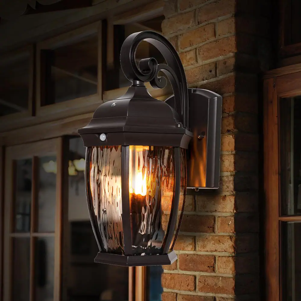 Home Decorators Collection Bronze Integrated LED Motion Sensing Dusk to Dawn Outdoor Wall Lantern Sconce Light with Flickering Bulb/Clear Glass