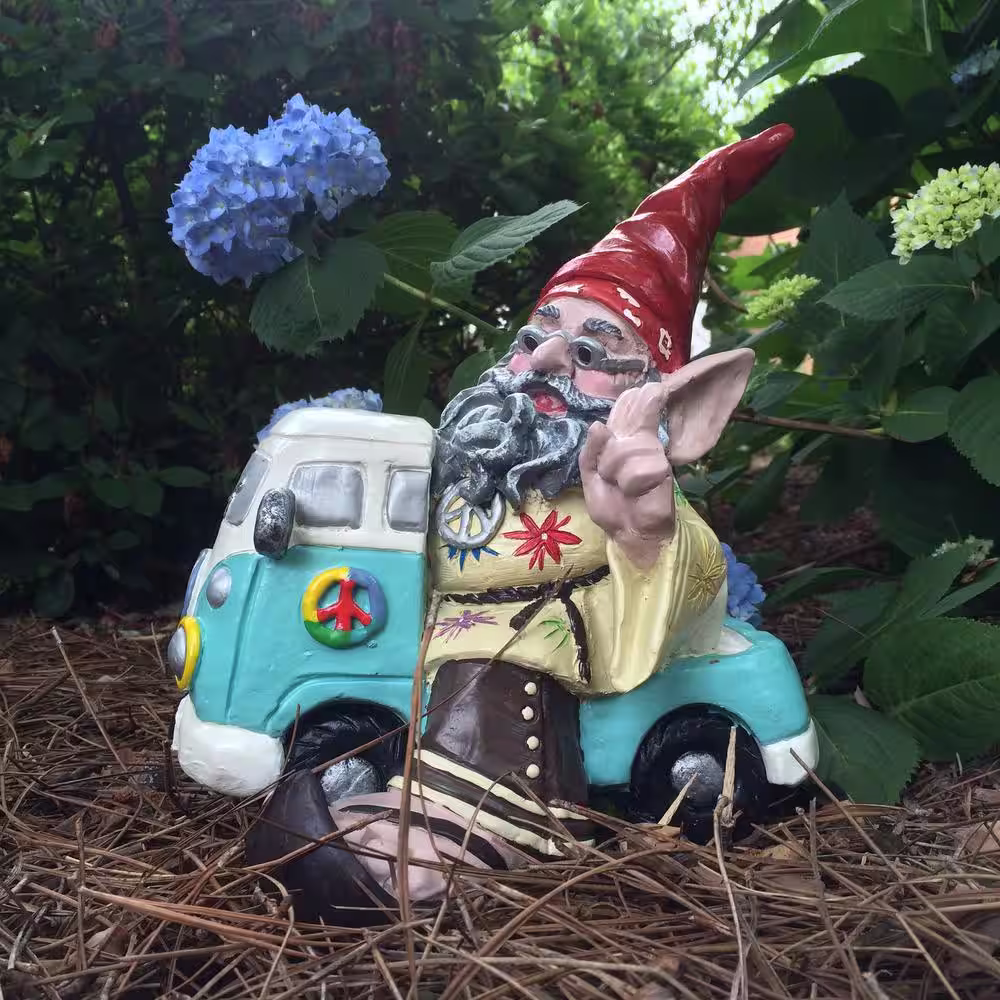 HOMESTYLES 11 in. H 60's Jerry Peace Man Hippie Gnome Riding in His VW Bus Home and Garden Gnome Statue