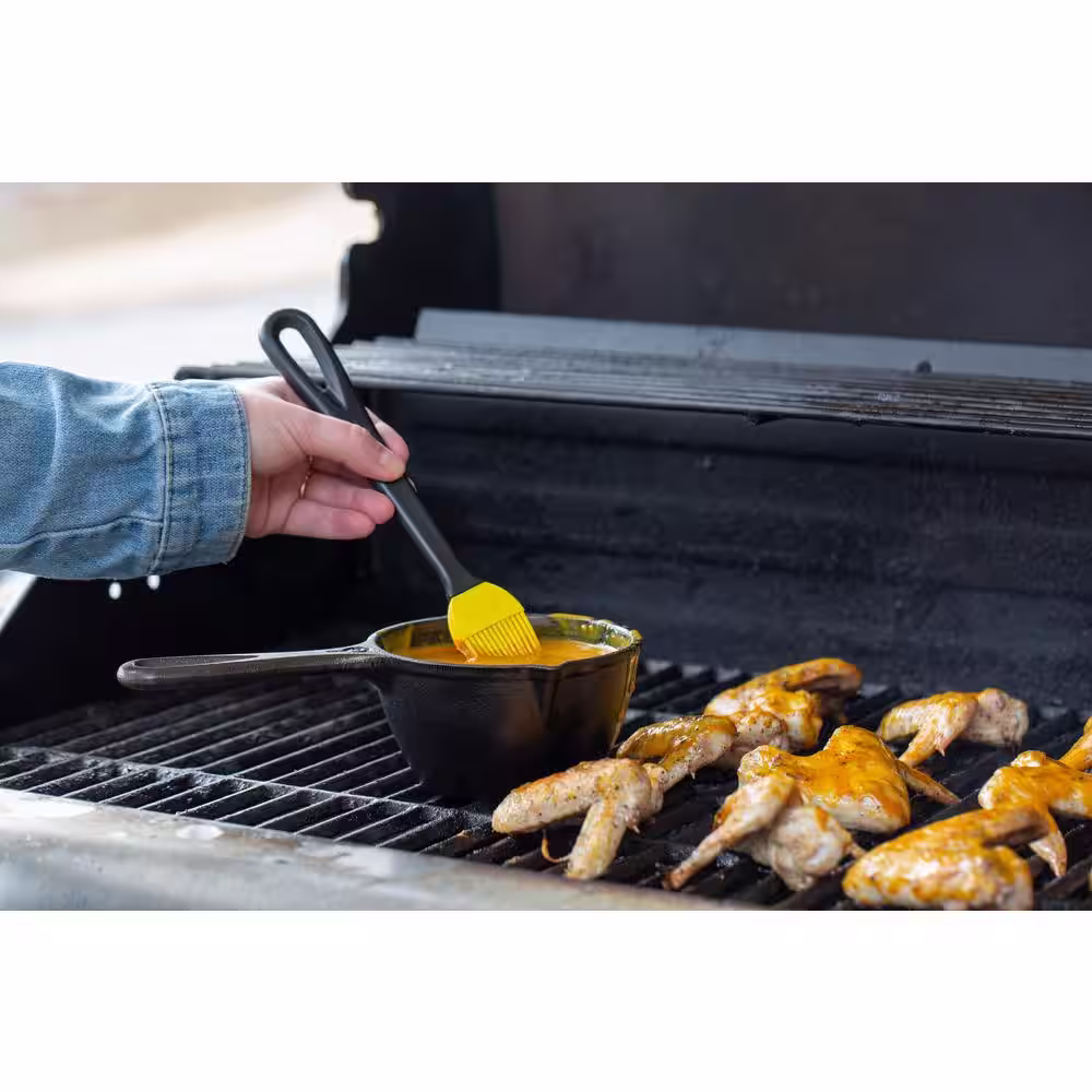 Lodge 0.5 qt. Cast Iron Melting Pot in Black with Silicone Brush