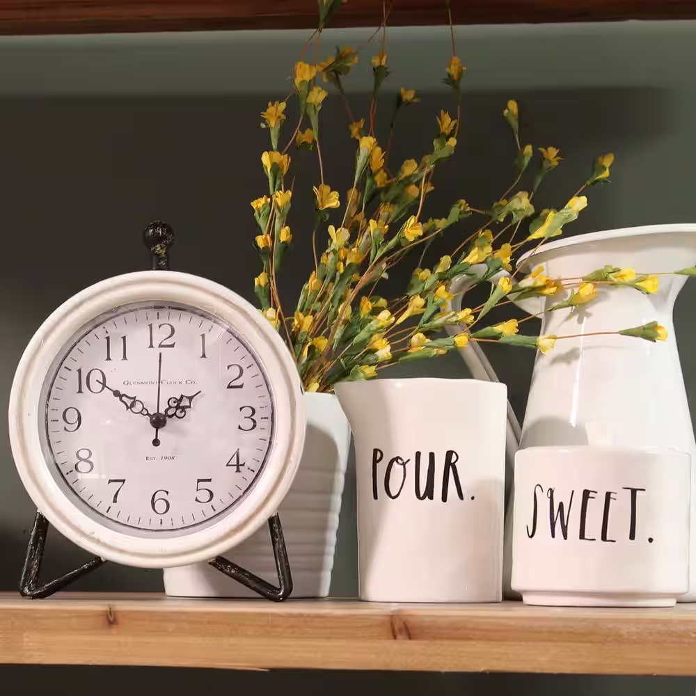 Stratton Home Decor Daisy Table Clock